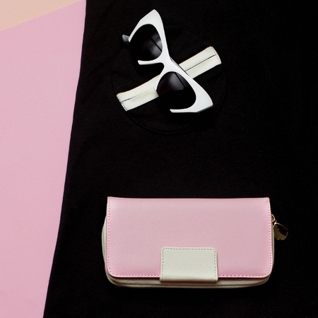 Retro outfit. Vintage dress and accessories. Glasses and clutch. Glamorous Lady. View from above