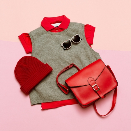 Stylish clothes set. City casual fashion. Spring. Stylish accessories. Cap, Red Bag, Hipster Girl lookの写真素材