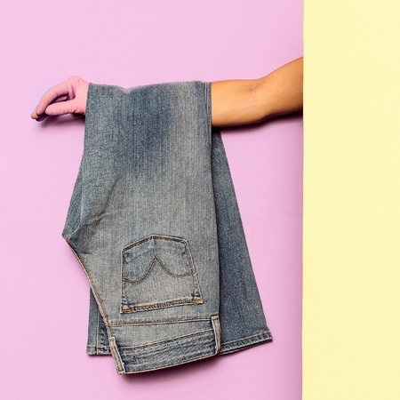 Stylish clothes. Flared jeans. Denim. Minimal fashion. Wardrobe Trends Ideasの写真素材