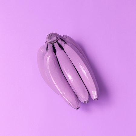 Pink bananas on a pink background. Surreal minimal artの写真素材