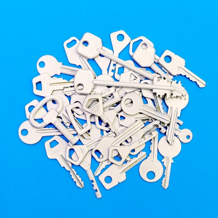 Many Keys on a blue background. Minimal style