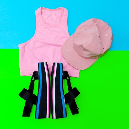Stylish beach sportswear. Sandals platform. Cap. Summer outfitの写真素材