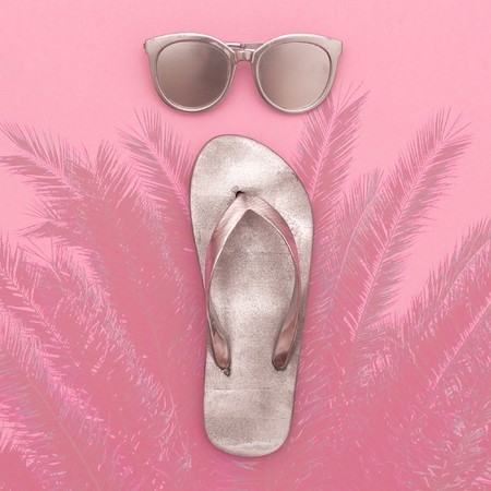 Silver set vacation. Flip-flops and sunglasses, beach fashion styleの写真素材