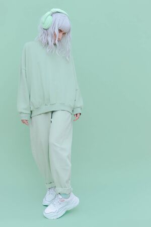 Party Dj Girl in Fresh Mint clothing. Minimal aesthetic monochrome design. Aqua menthe  trendの写真素材