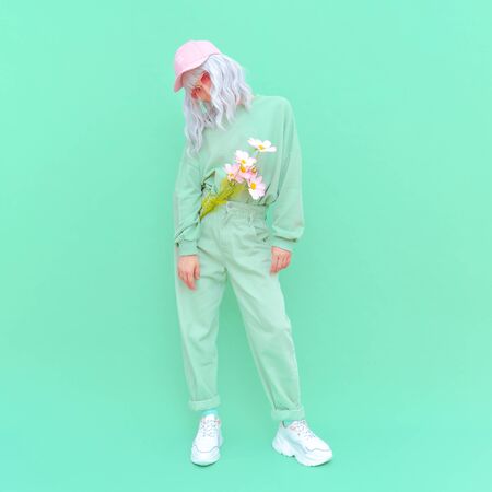 Vanilla Mint urban style. Girl 90s aesthetic. Monochrome color trends. Aqua Menthe mood