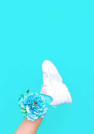 Fashion white shoes. Sneakers. Minimal aesthetic monochrome design.  Trendy colours blueの写真素材