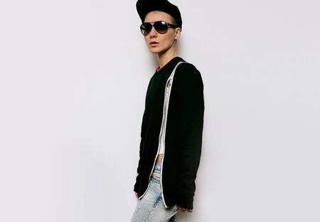 Tomboy style urban fashion model black outfitの写真素材