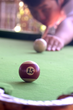 a man aim the last ball in pull game.の写真素材