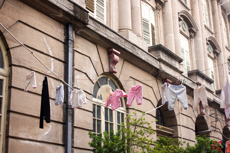Laundry on the clothesline the old town Shamian Island guangzhouchinaの写真素材