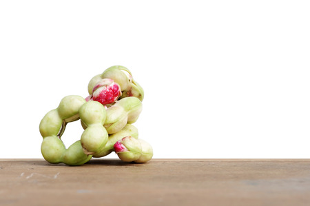 Manila tamarind on wooden background