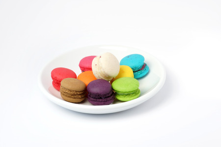 Colorful macarons on wooden backgroundの写真素材