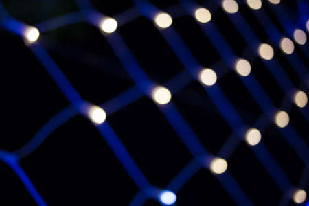 Lights blurred bokeh background from christmas night party for your design vintage or retro color...