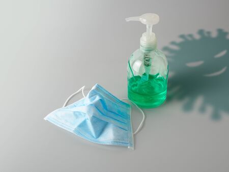 Sanitary masks and Alcohol hand wash gel help to prevent inflection from the Coronavirus or Covid-19 and other diseasesの写真素材