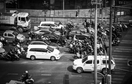 Car stop red light at the Asok Montri intersection, Sukhumvit road Bangkok Thailand, December 14, 2015のeditorial素材