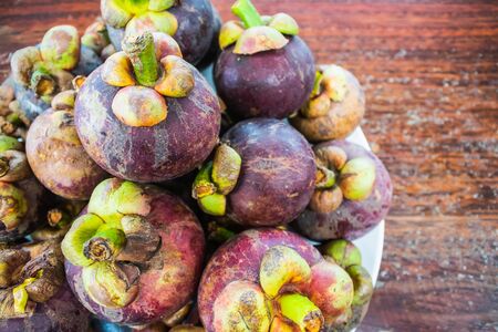 Pile of mangosteen fruit, Backgroundsの写真素材