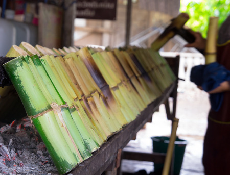 The sticky rice cooked with coconut in the bamboo,Thailhandの写真素材