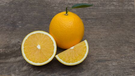 Oranges on a wooden tableの写真素材