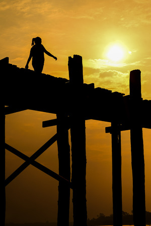 U bein bridge, Taungthaman lake, Amarapura, Burma. It is the oldest and longest teak wooden bridge in the worldの写真素材
