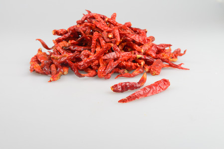 Close up of dried chili in glass bowl, food ingredient.