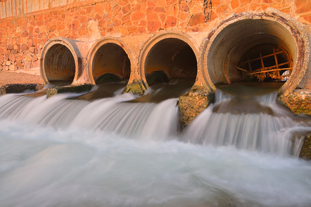 Sewerage pipes leading to the seaの写真素材