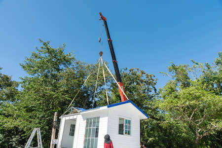 Prefab house, prefabricated house crane.の写真素材