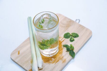cup of green tea with mint,lemon grass,soft focusの写真素材