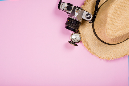 Travel accessories objects and gadgets top view flat lay on pink pastel. Travel Conceptの写真素材