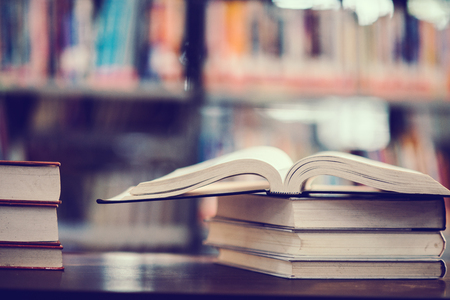 Book in library with open textbook,education learning conceptの写真素材