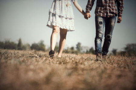 Portrait of a couple in love walking with balloons colorfulの写真素材