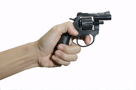 Man hand holding black gun on white  backgroundの写真素材