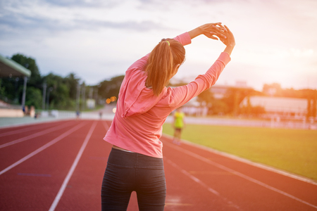 woman fitness sunrise jogging workout wellness concept.の写真素材