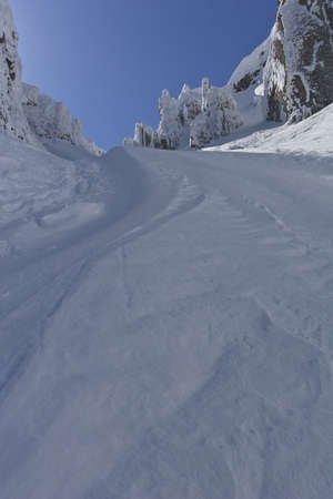a mountain path in the middle of winter