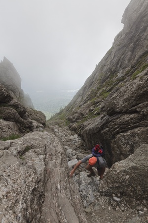 a climber on a mountain valley in Bucegi Mountains, Romaniaのeditorial素材