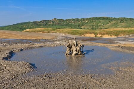 Strange landscape produced bu active mud volcanoesの写真素材