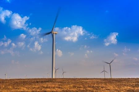 wind power turbines on a hill in morningの写真素材