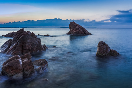 waves and rocks on a wild beach