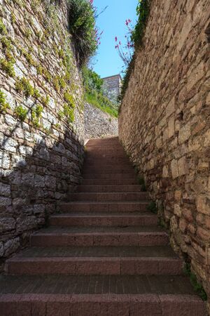 Medieval stepped street in the Italian hill town of Assisiの写真素材