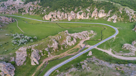 mountain landscape with some of the oldest limestone rock formations in Europe in Dobrogea Gorges (Cheile Dobrogei) Romaniaのeditorial素材
