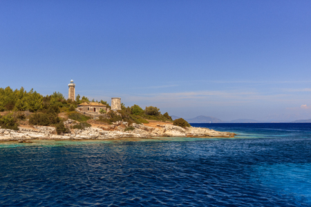 Fiscardo Venetian lighthouse and Byzantine Church. Kefalonia Greeceの写真素材