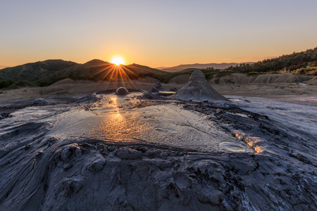 sunset in Mud Volcanoes. Buzau county, Romania