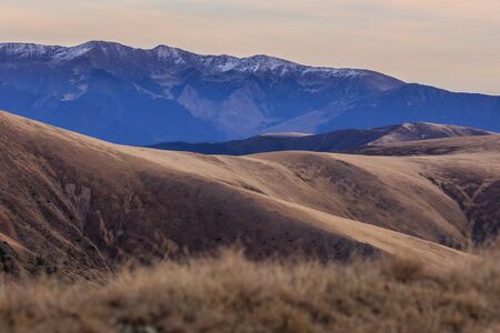 mountain landscape in Fagaras Mountains, Romania. In  background Iezer Mountains