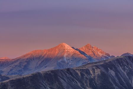 sunrise in Fagaras Mountains, Romania. Lespezi Peak 2517m and Negoiu Peak 2535 m