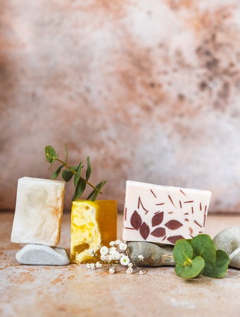 Natural organic soap bars. Homemade cosmetics, eco-friendly spa, beauty skincare concept. Small business, ethical shopping idea. Pastel minimal composition. Beige background.の写真素材