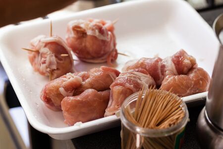 Italian braciole in a white plastic trayの写真素材