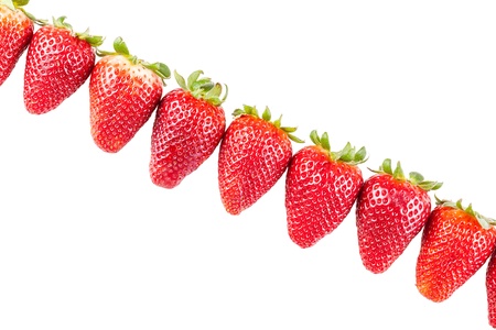 Studio shot of ripe and vibrant strawberriesの写真素材