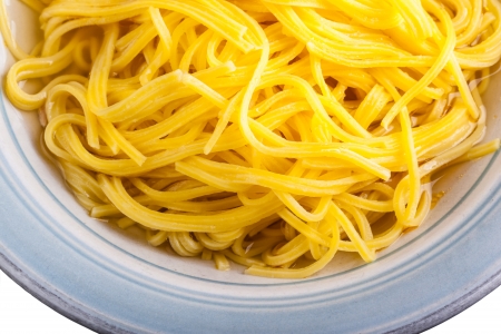 macro shot of a plate full of cooked home made tagliolini