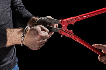 criminals that try to break handcuffs with a big pair of shears