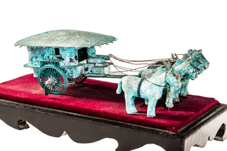 an ancient chinese chariot reproduction isolated over a white の写真素材