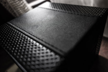 macro shot of an elegant black leather box