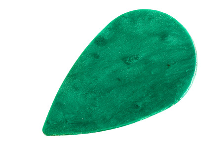 a green guitar pick isolated over a white background